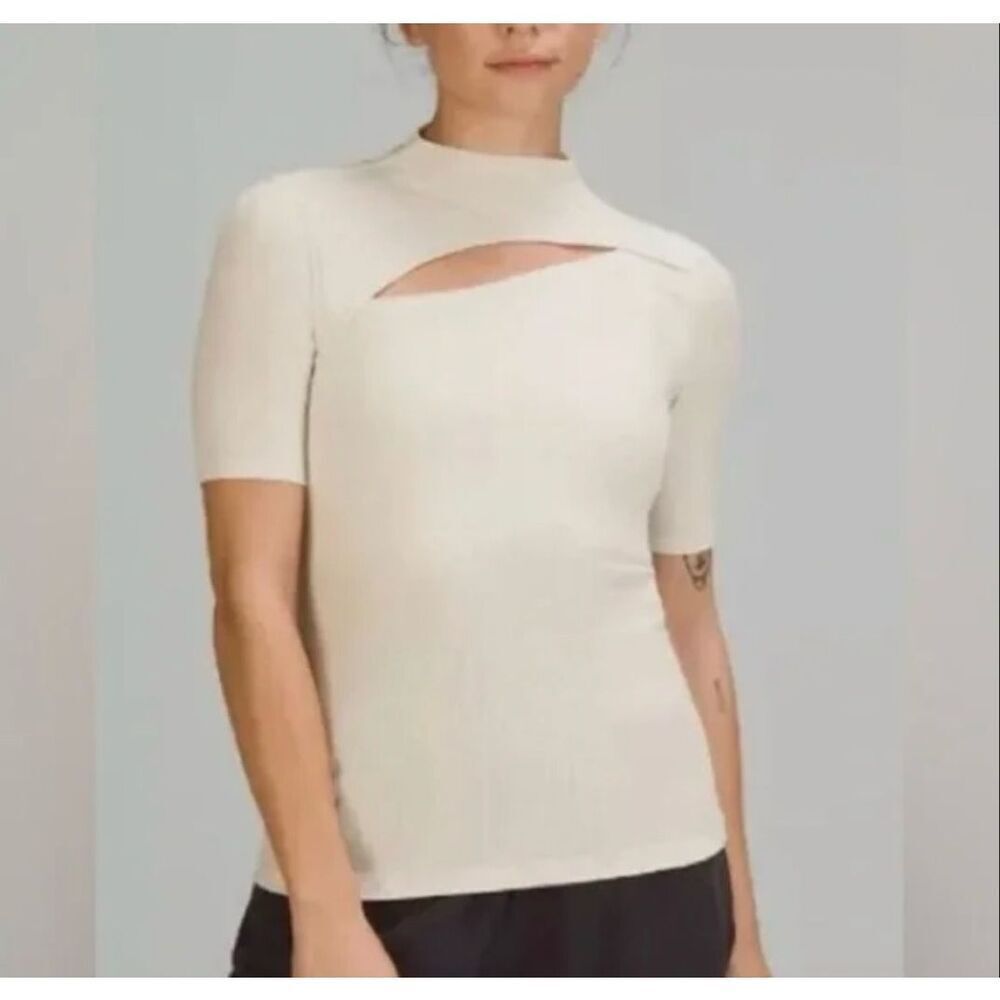 Lea & Viola cream color peekaboo knit top